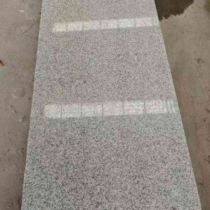 岳阳芝麻白光面毛板